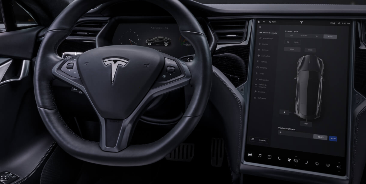 The steering wheel and touchscreen display in the Model S.