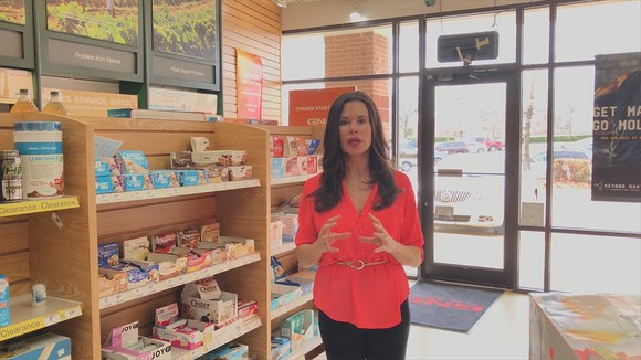 Woman in GNC store