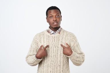 Getty - man excuses african-american surprised