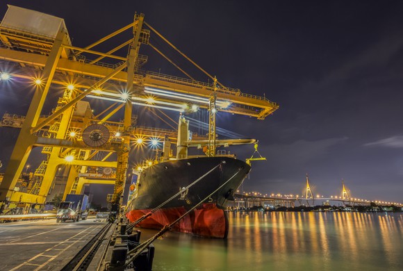 Crane loading a container ship.