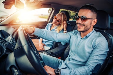 people driving car automobile rental source getty