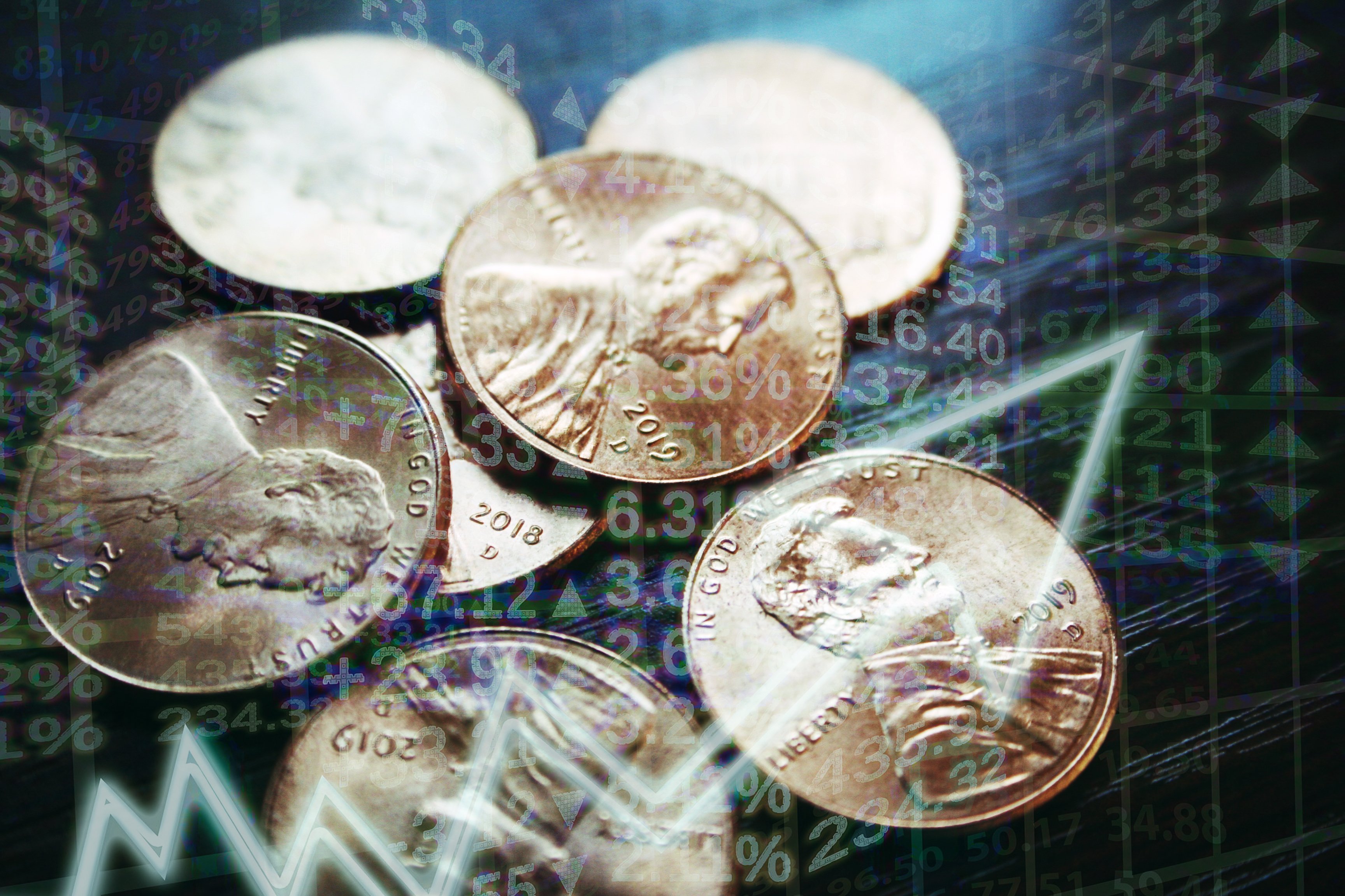 Pennies with numbers and an upward sloping line