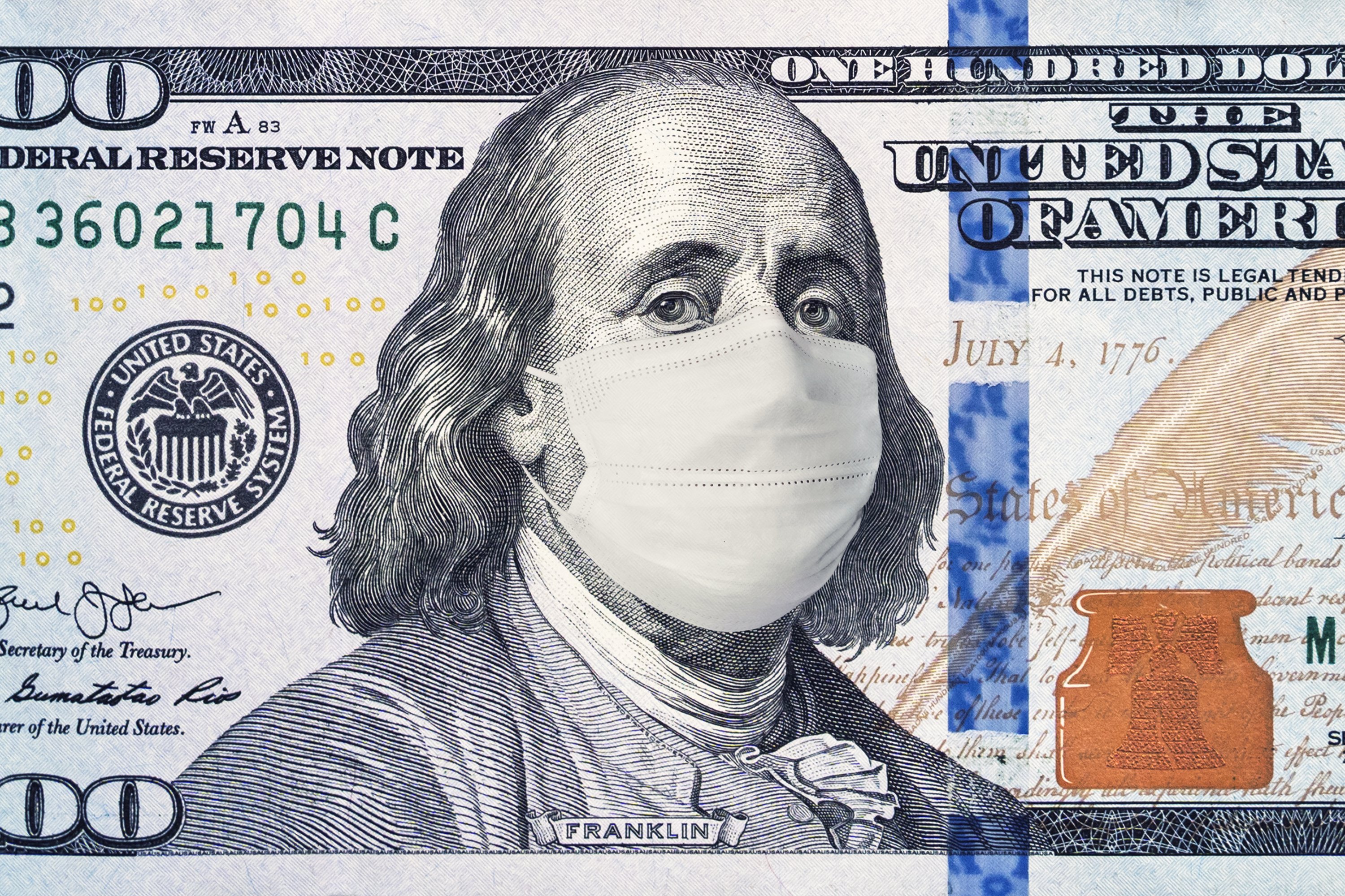 Hundred dollar bill with Ben Franklin wearing a mask 