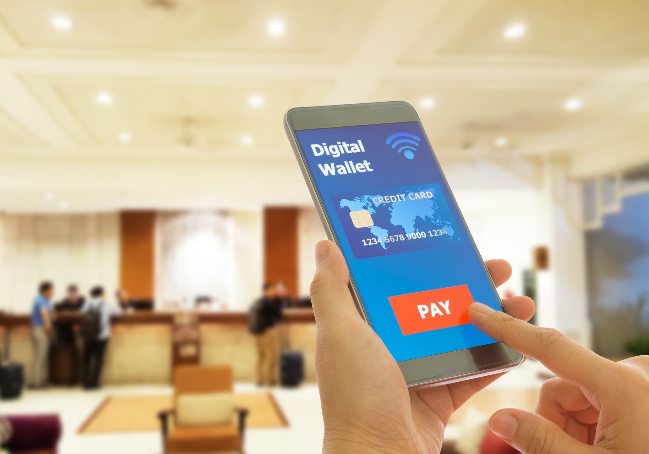 User tapping on "pay" on digital wallet on mobile phone