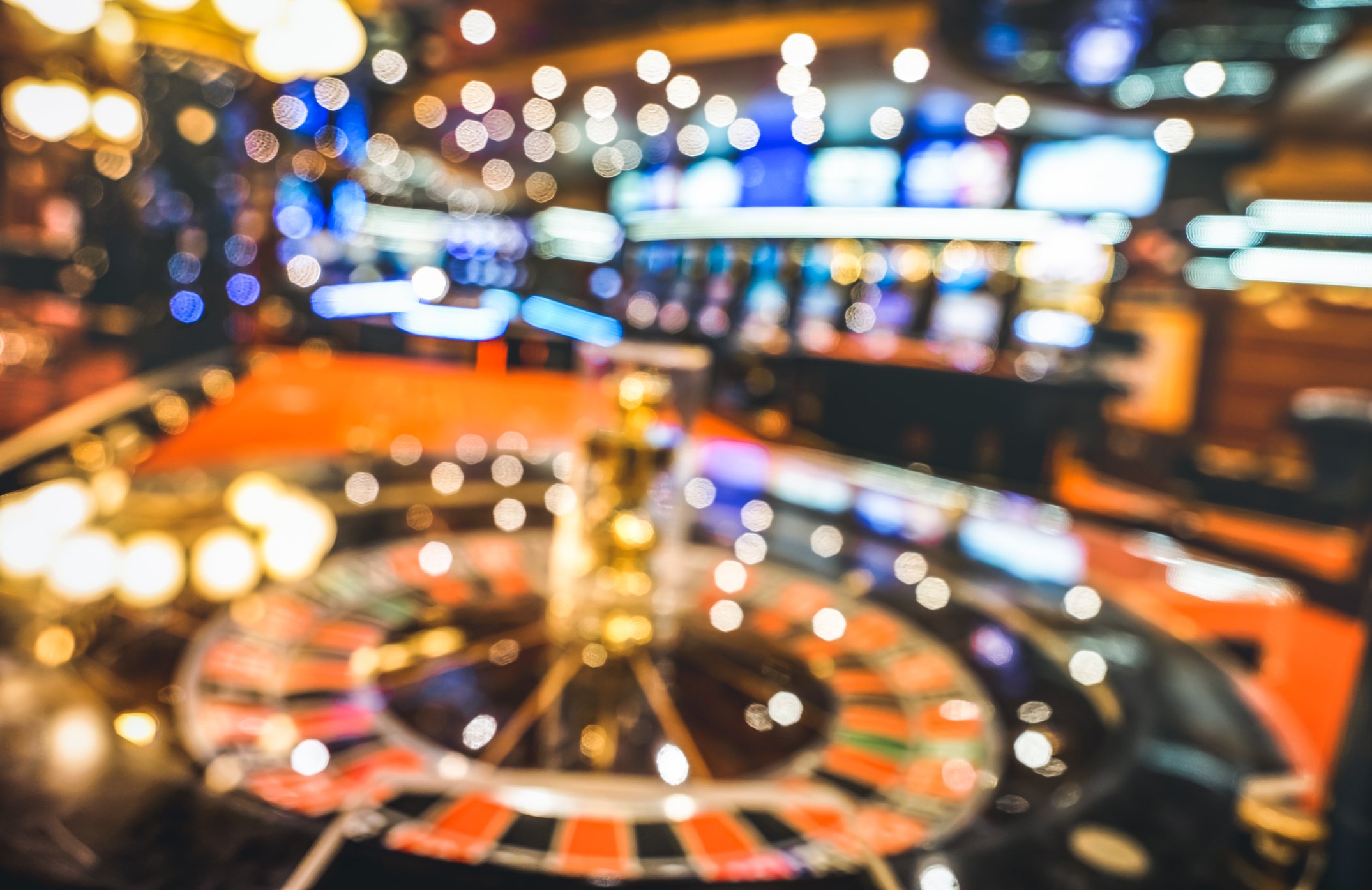 Picture of a casino floor with a blurred lens. 
