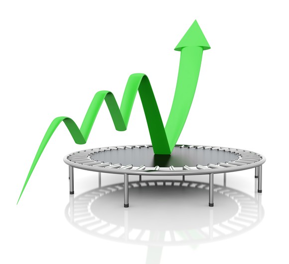 A green charting arrow bounces skyward off a black trampoline.