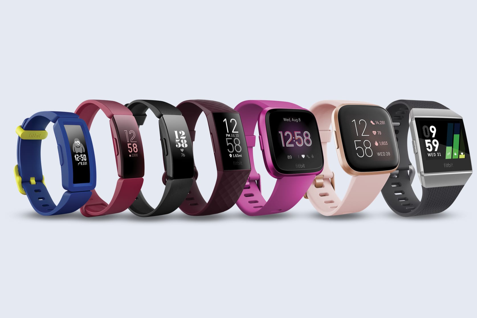 A selection of Fitbit activity trackers.