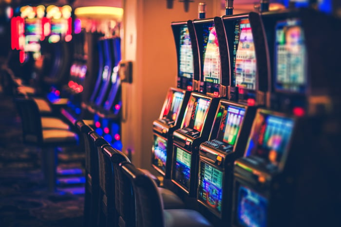 Slot machines on a casino floor. 