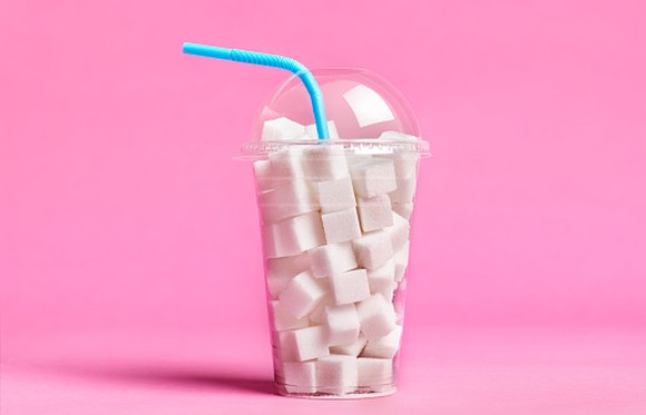 A cup full of sugar cubes