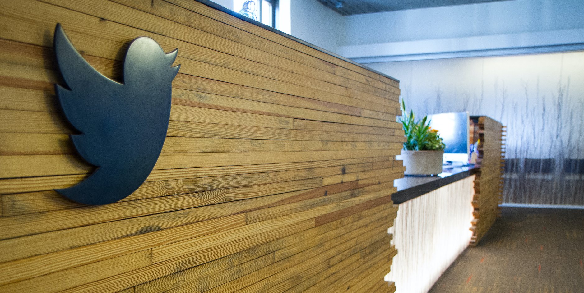Close-up of bird logo on reception desk at Twitter headquarters