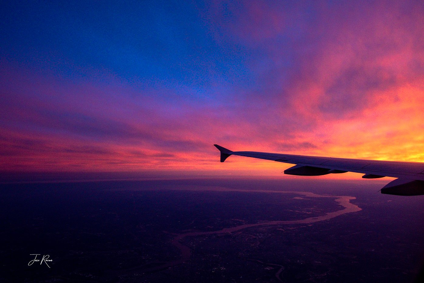 Aircraft winglet at sunrise.