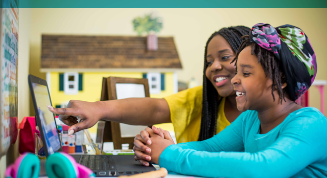 Two children taking part in a homeschooling lesson.