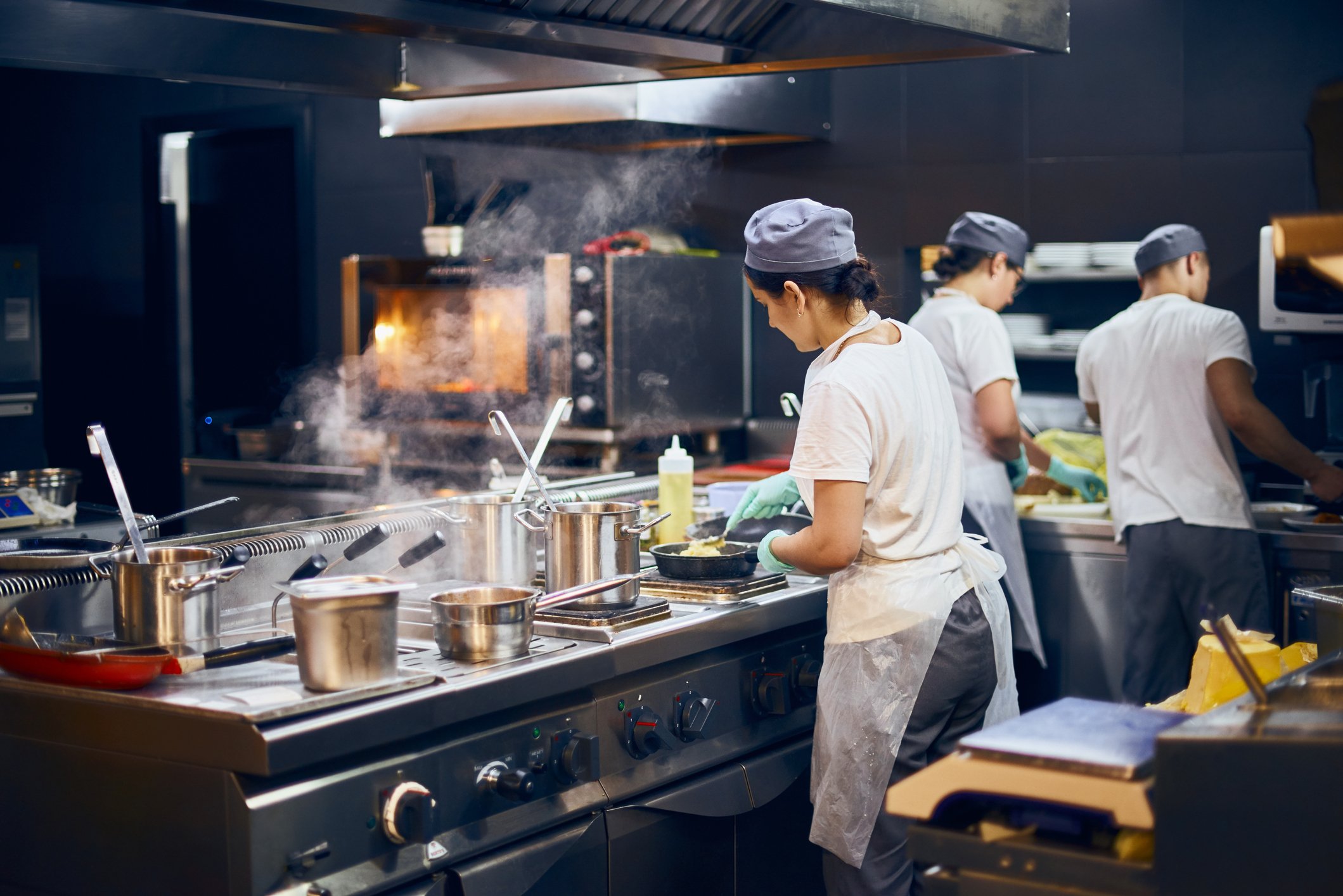 A restaurant kitchen in operation. 
