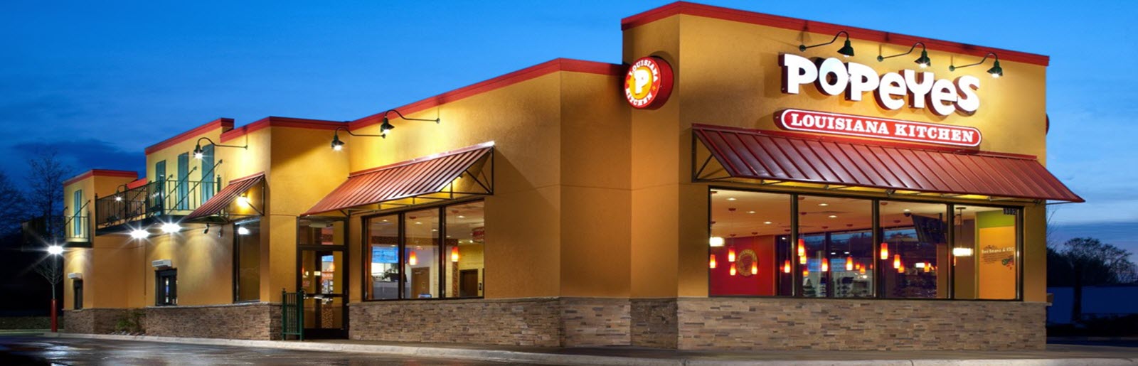 The exterior of a Popeyes restaurant