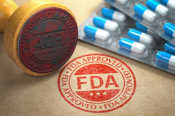 A rubber stamp denoting FDA approval