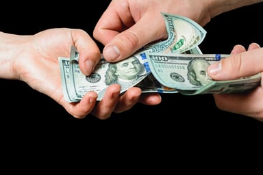 Handing Over Cash
