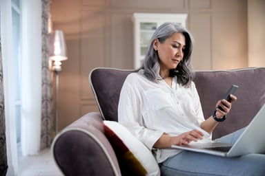 50-yo-woman-looking-at-phone
