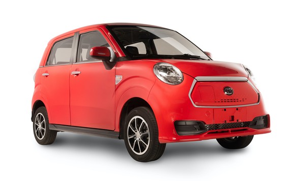 A red Kandi K27, a small and simple four-door electric hatchback.