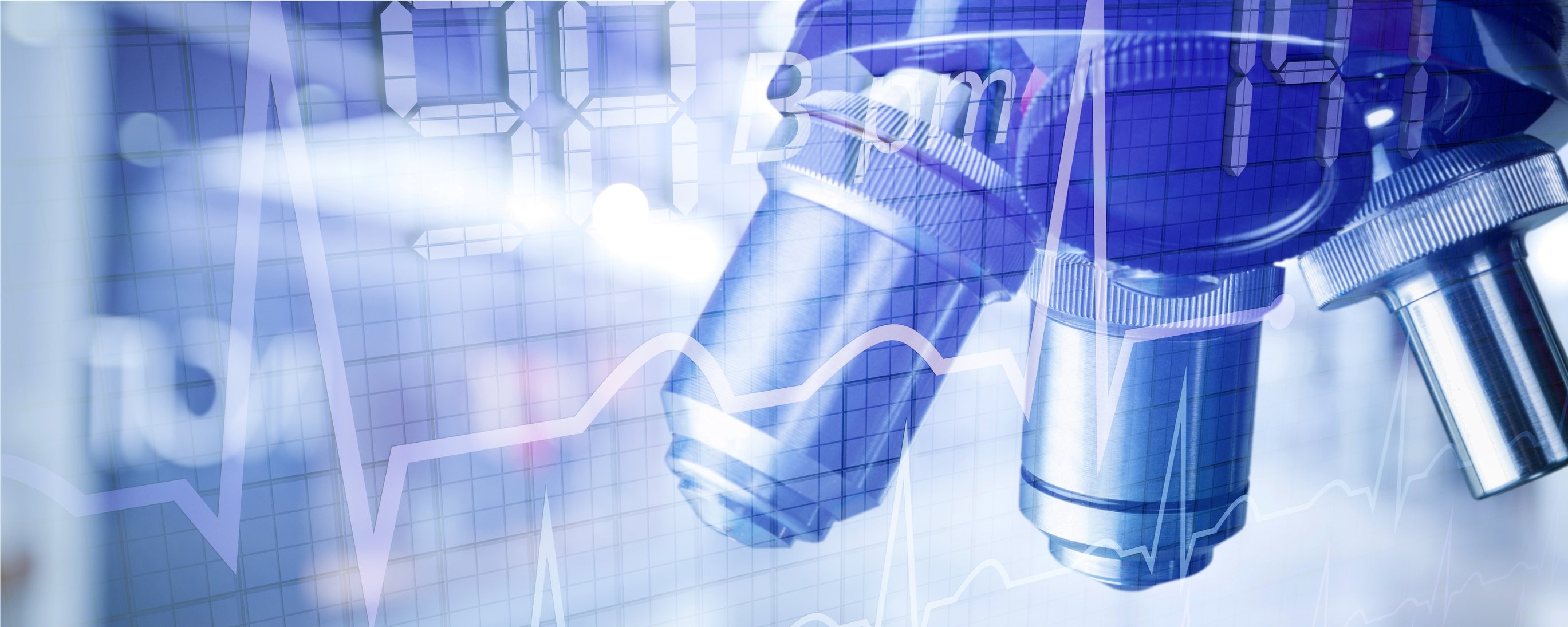 Close-up of a microscope with heartbeat graph and numbers