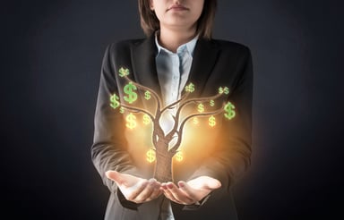 Business woman holding an animated money tree