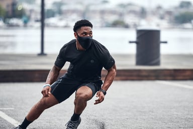Deonte Harris modeling and Under Armour face mask