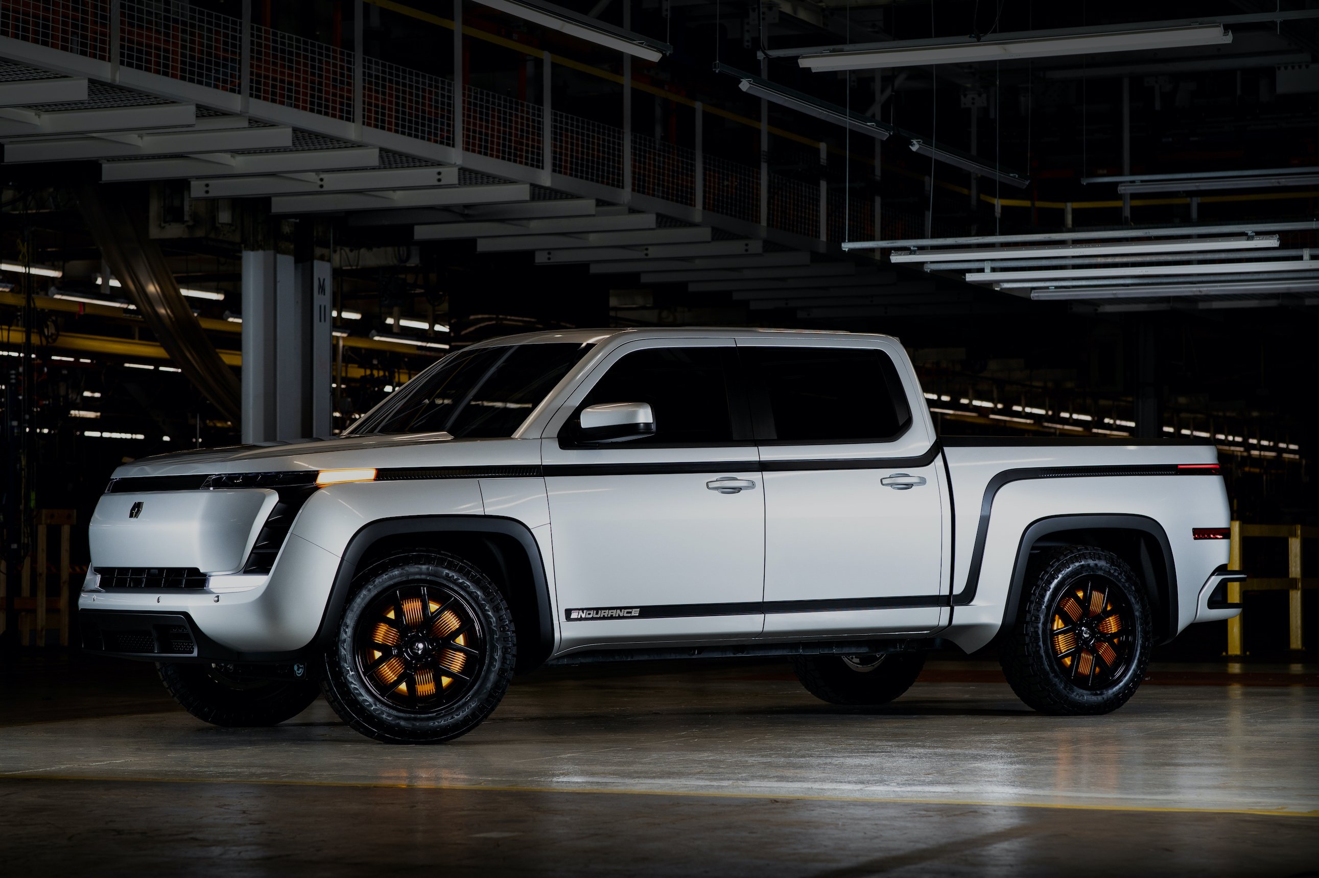 A silver Lordstown Endurance, a sleek electric pickup truck, in the company's factory in Lordstown, Ohio. 