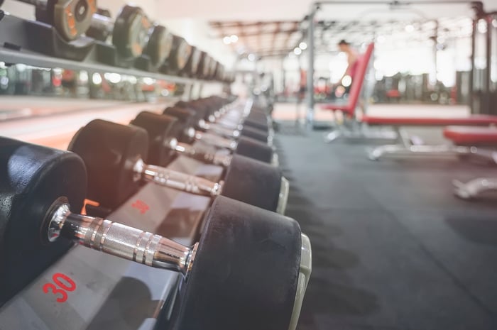 A rack of barbells in a gym.