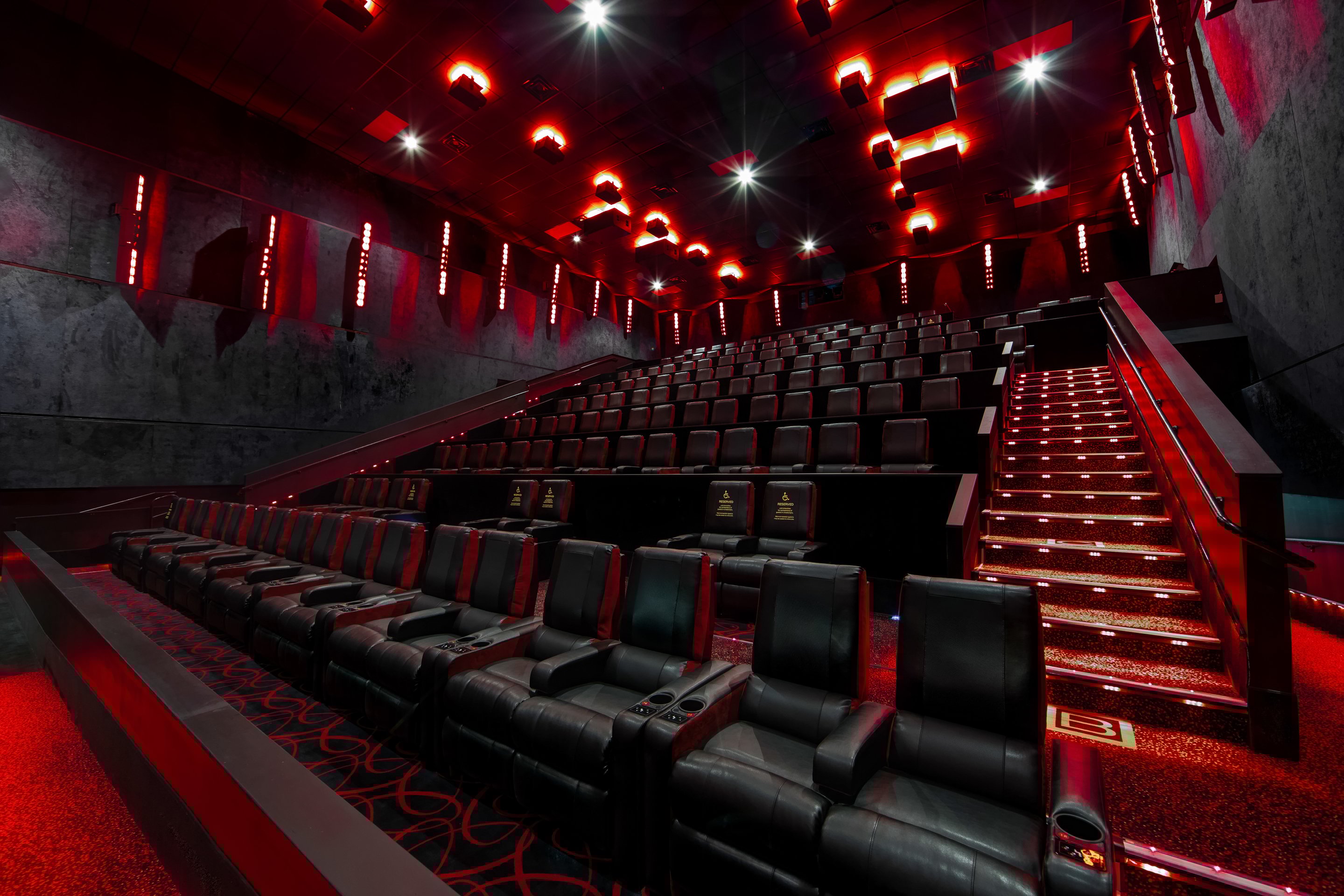 An empty AMC Theater with reclining seats.
