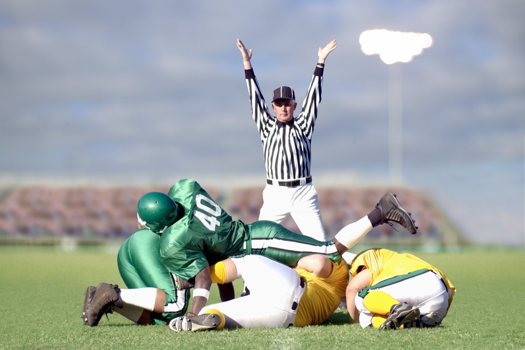 Football referee signaling a touchdown