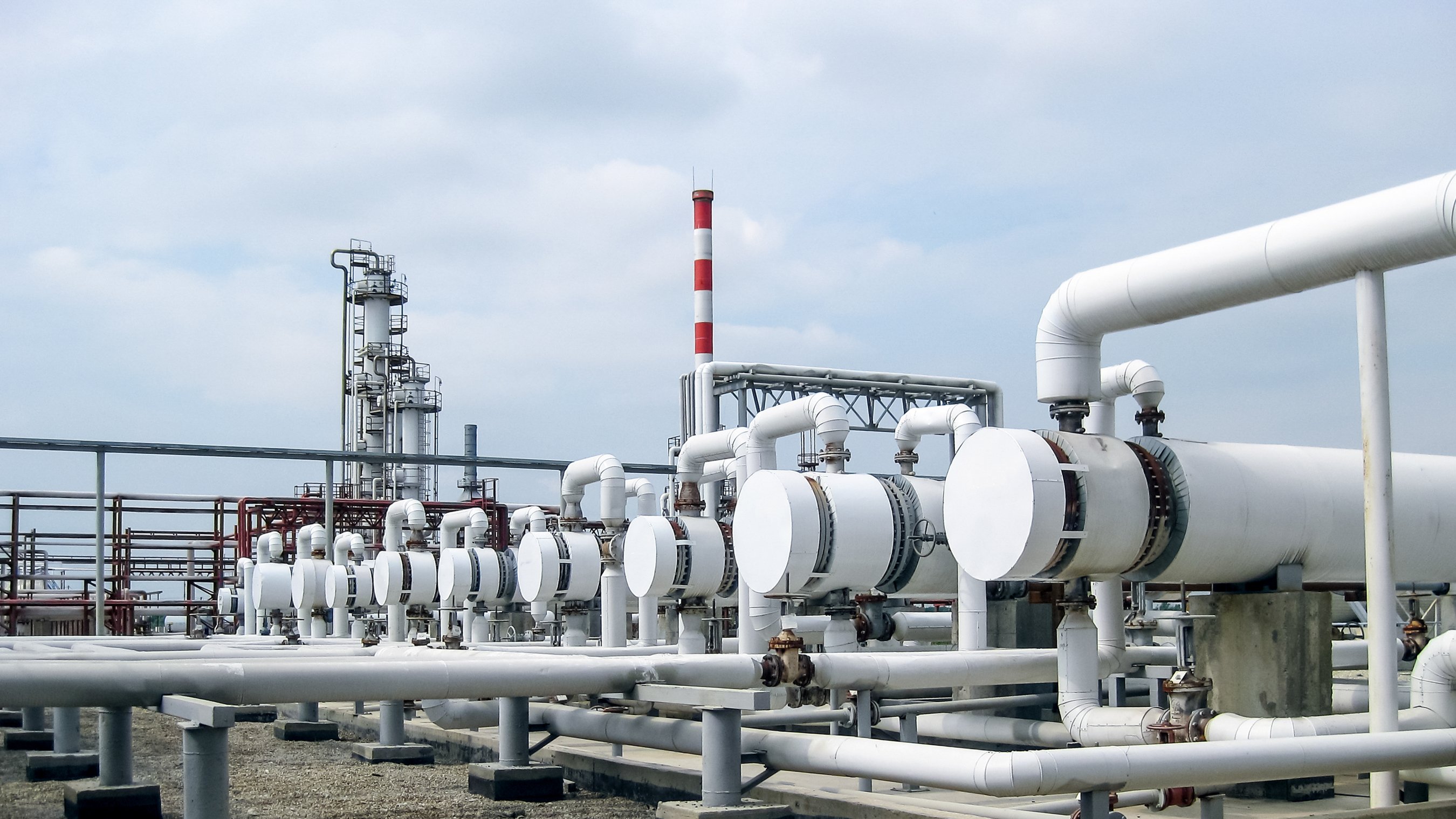 Oil gathering and processing pipes at a plant. 