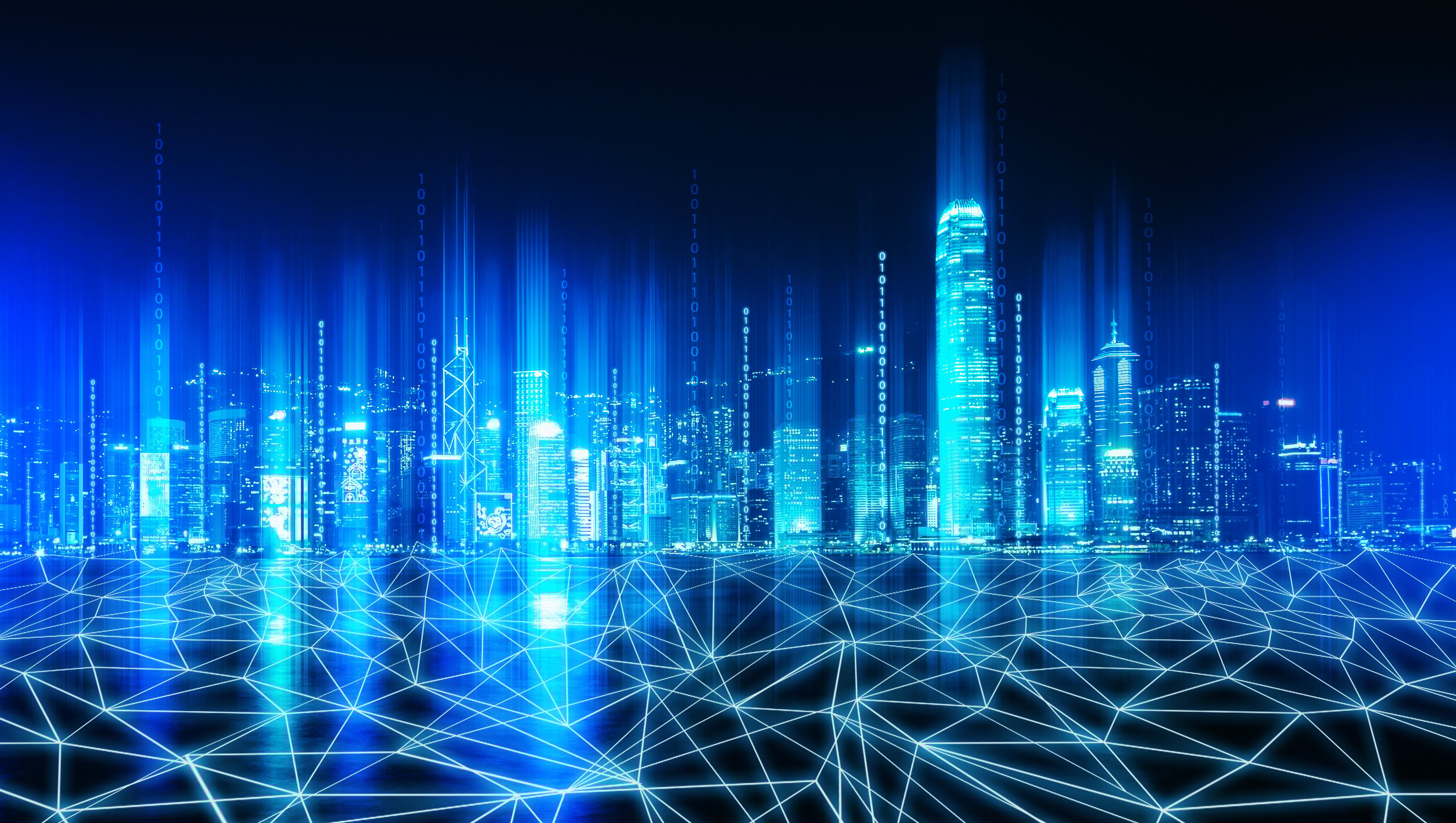 fiber lights up underneath a city skyline in luminescent blue. 