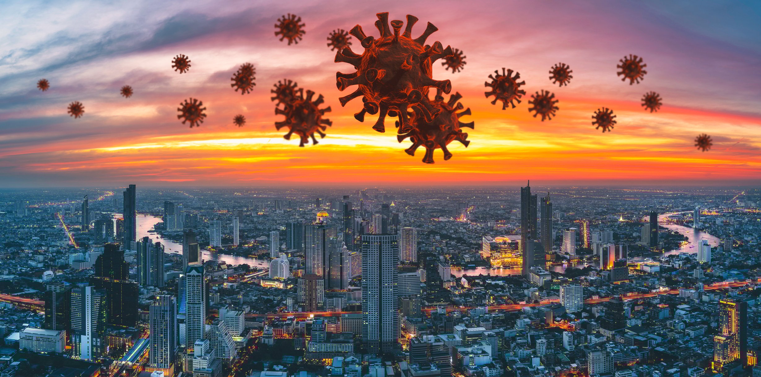 Coronavirus microbes hovering over a city