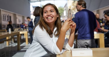 girl with iphone 8 apple aaplsource-aapl