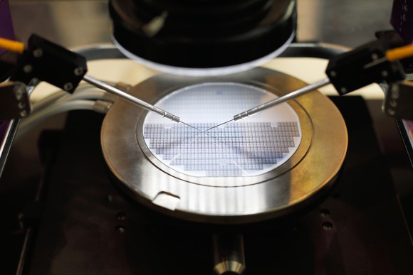 Probe testing of a silicon wafer.
