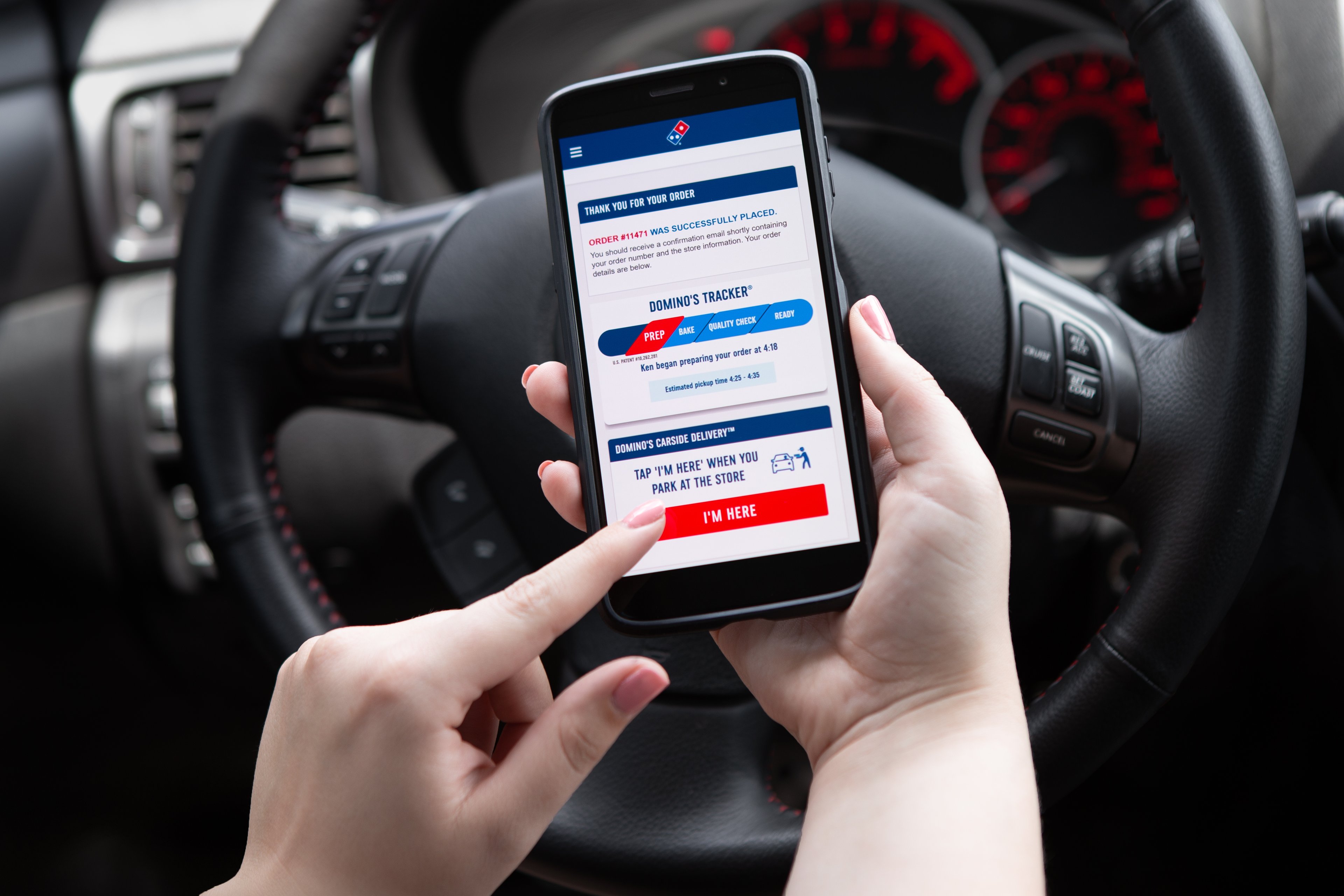 A customer places an order with the Domino's mobile app