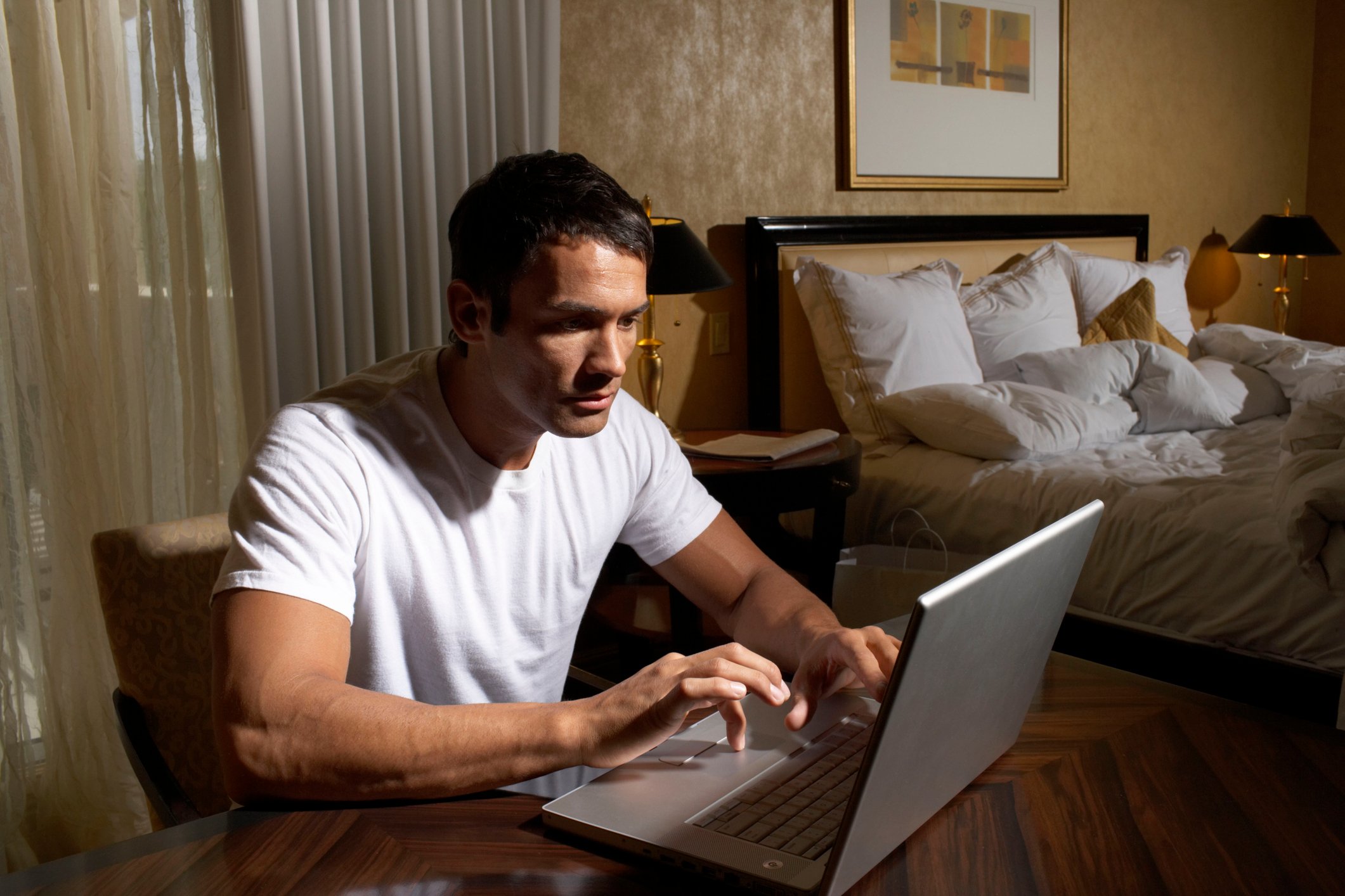 Man using laptop computer. 