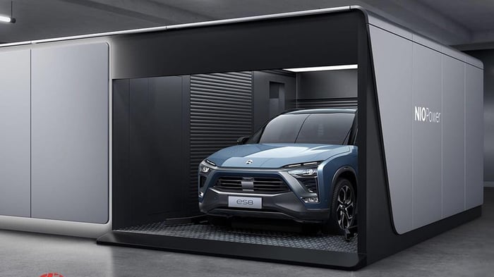 An NIO electric SUV at one of the company's battery exchange stations.