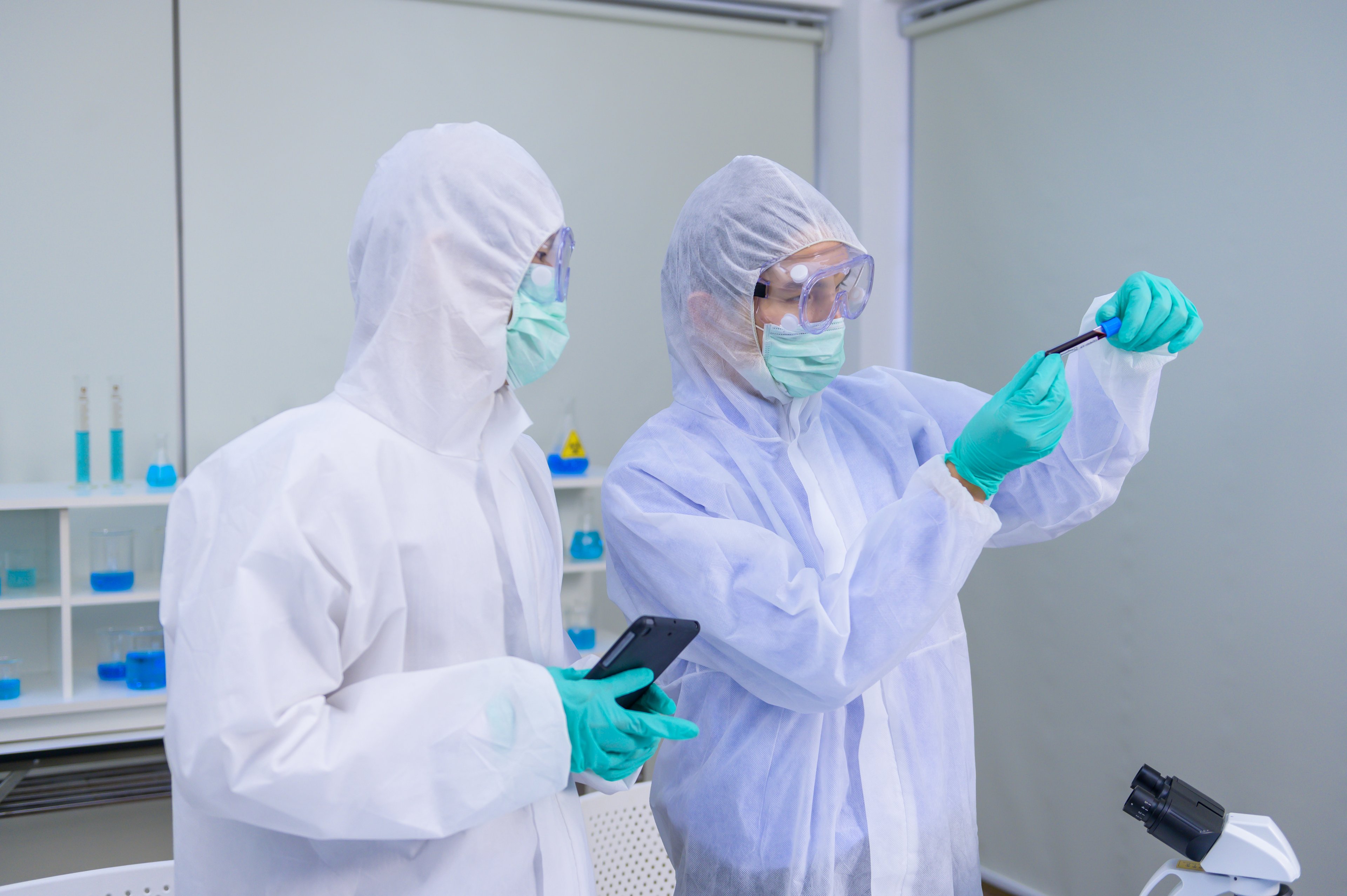 Scientists researching coronavirus in the lab. 