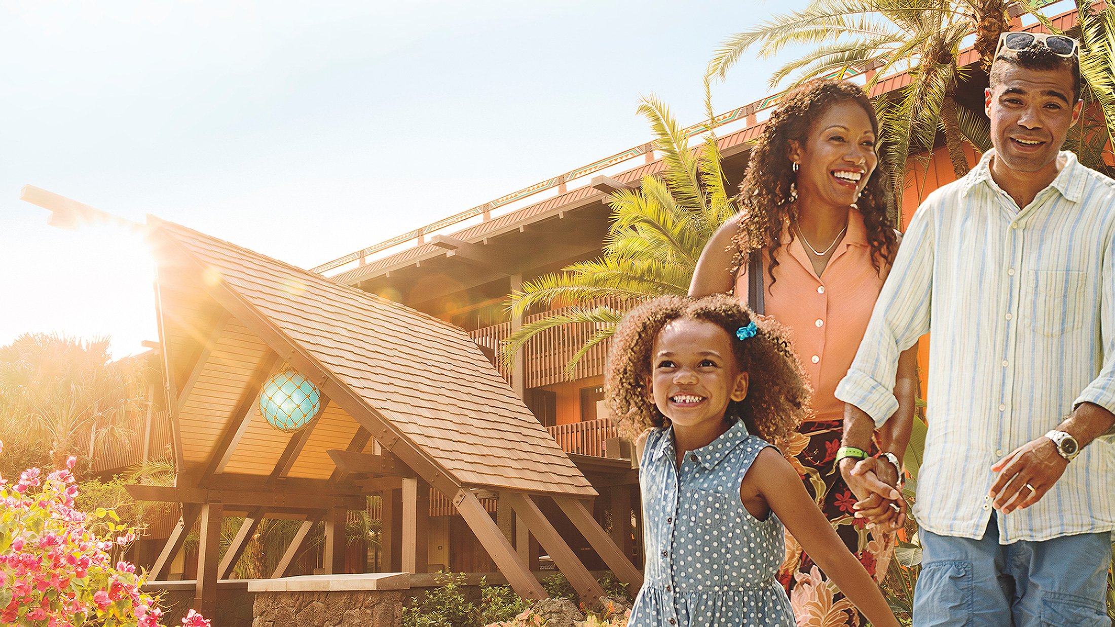 A family of three enjoying Disney's Polynesian Village Resort at Disney World.
