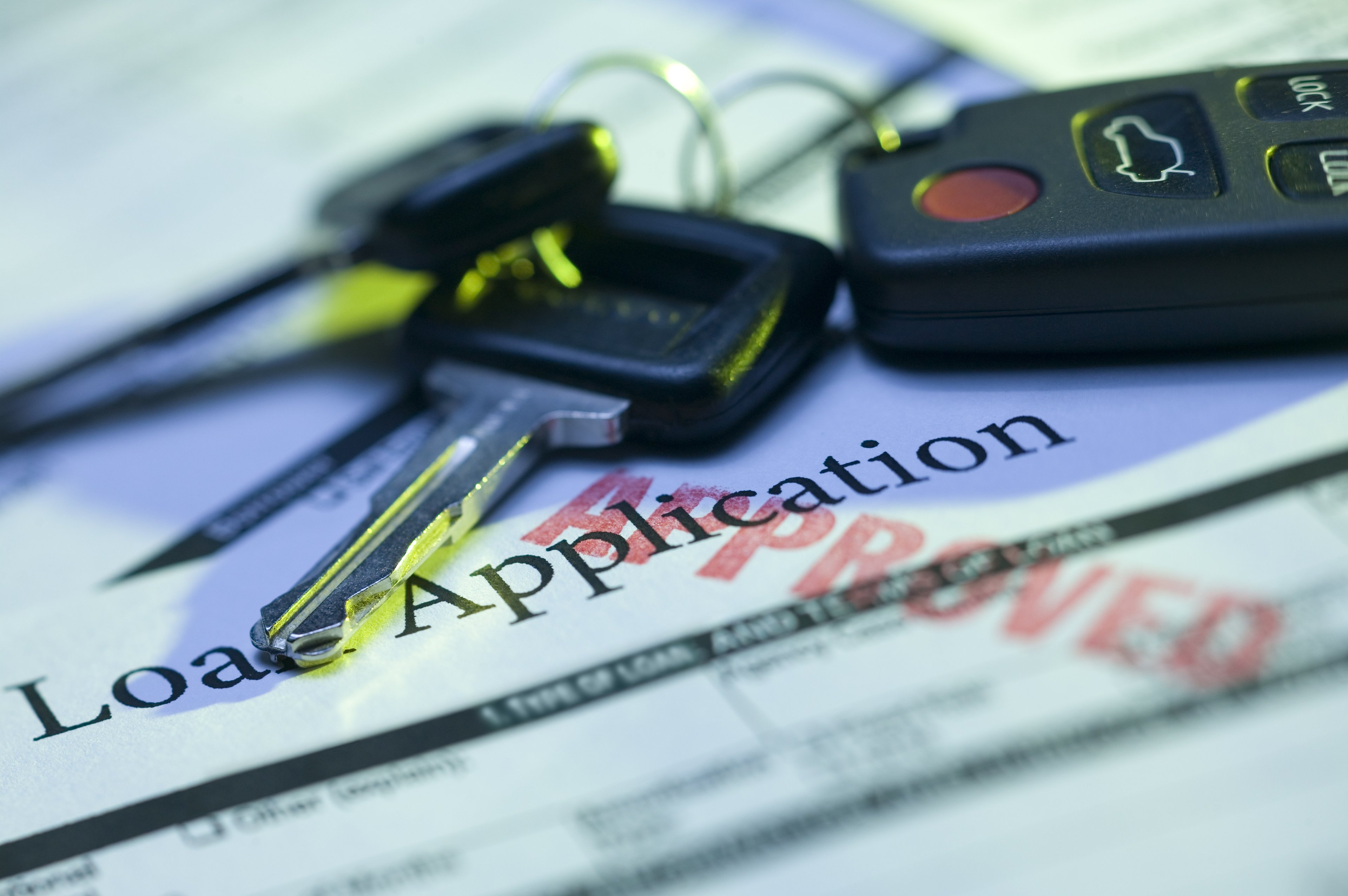 Keys on top of auto loan application