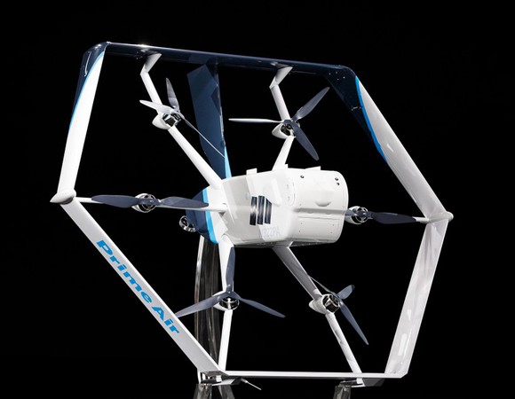 The Amazon drone against a black background