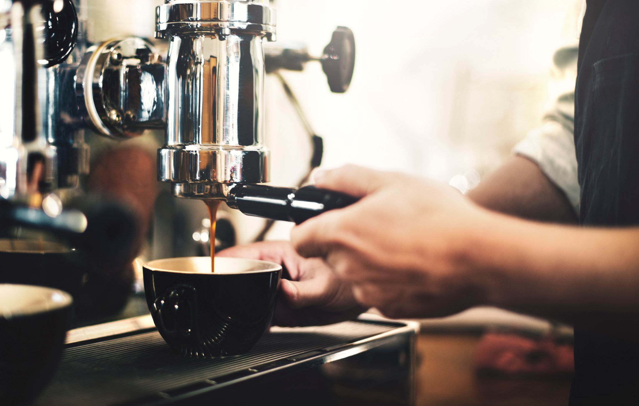 Barista making a cup of espresso.