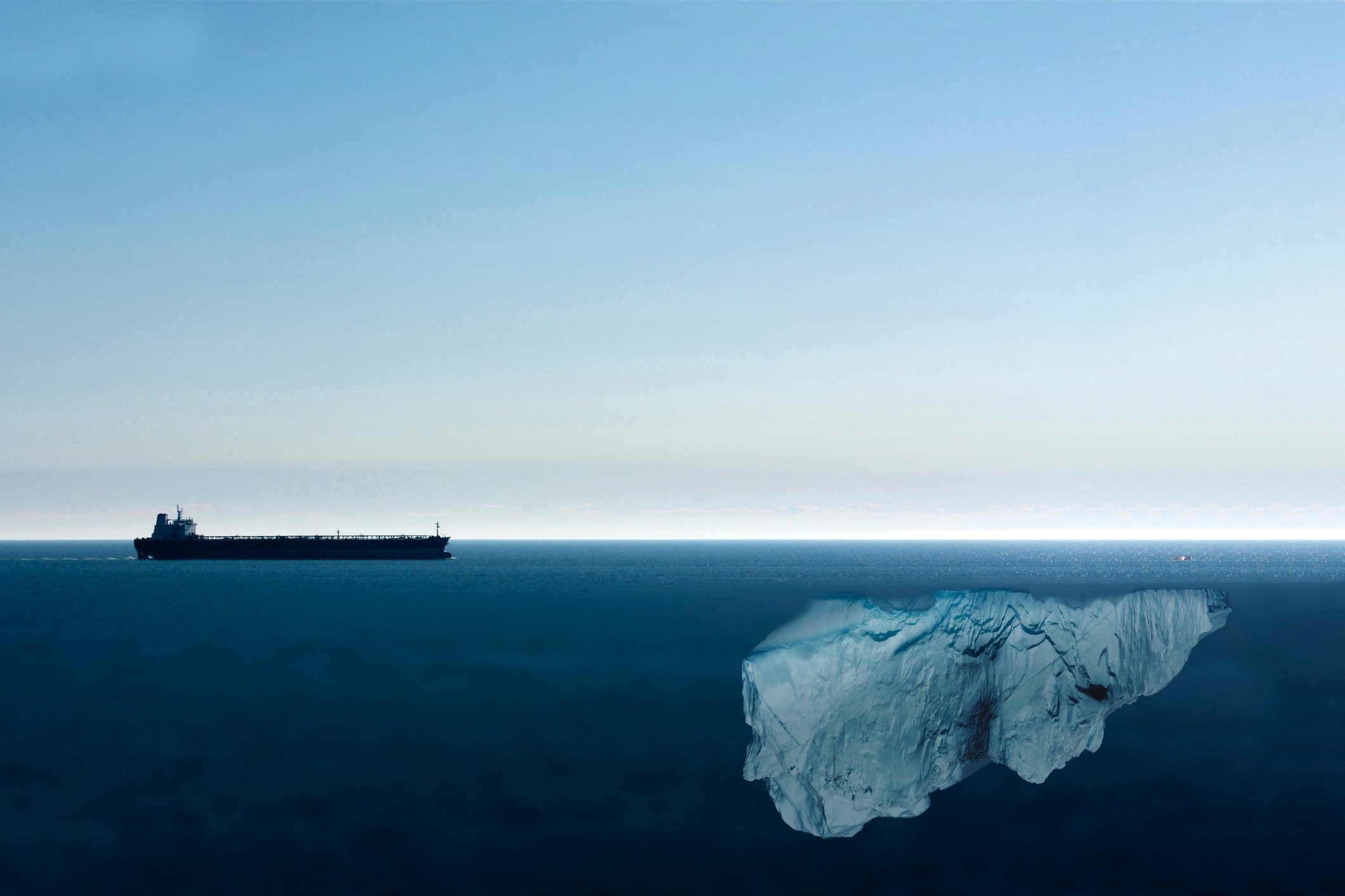 An ship approaching a hidden ice berg