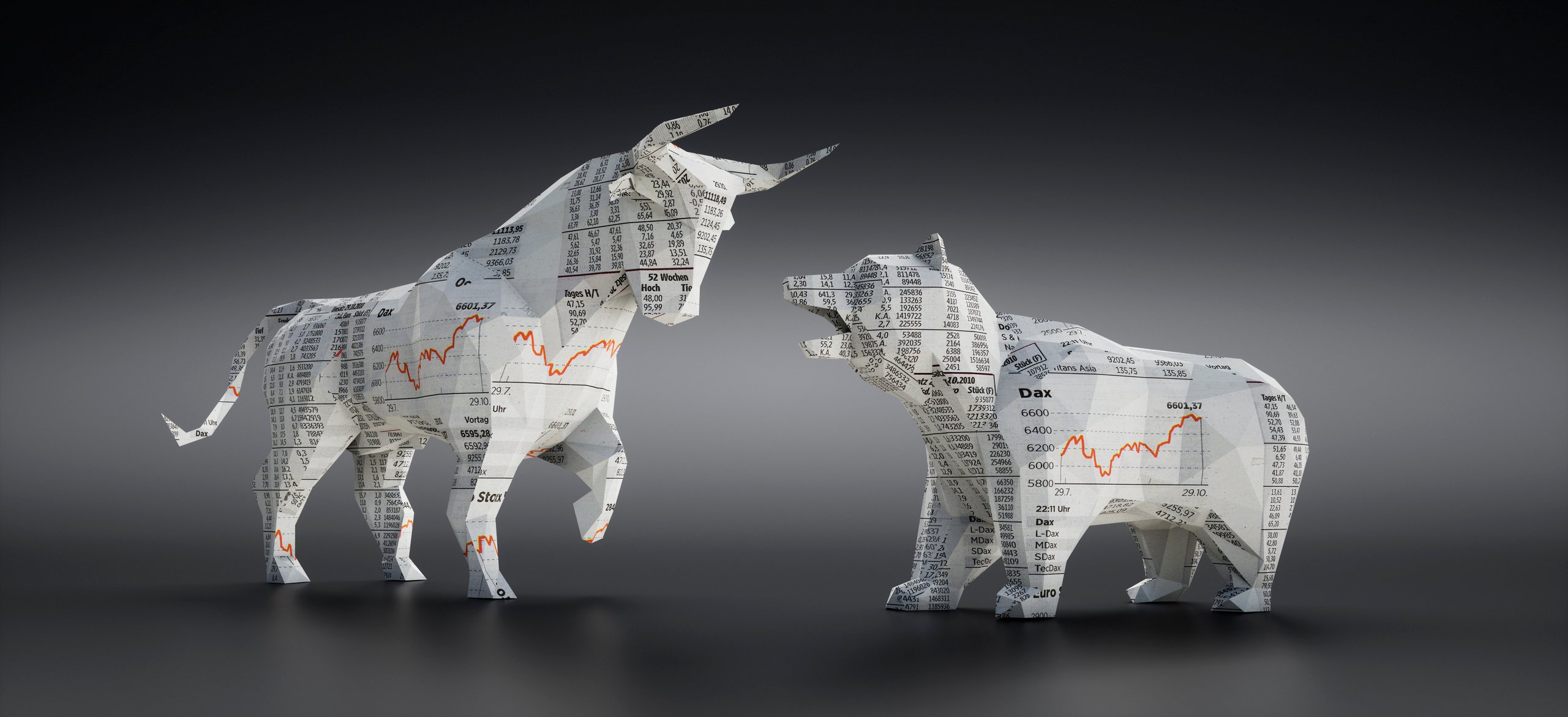 Paper bull and bear made out of the stock market section of the newspaper.
