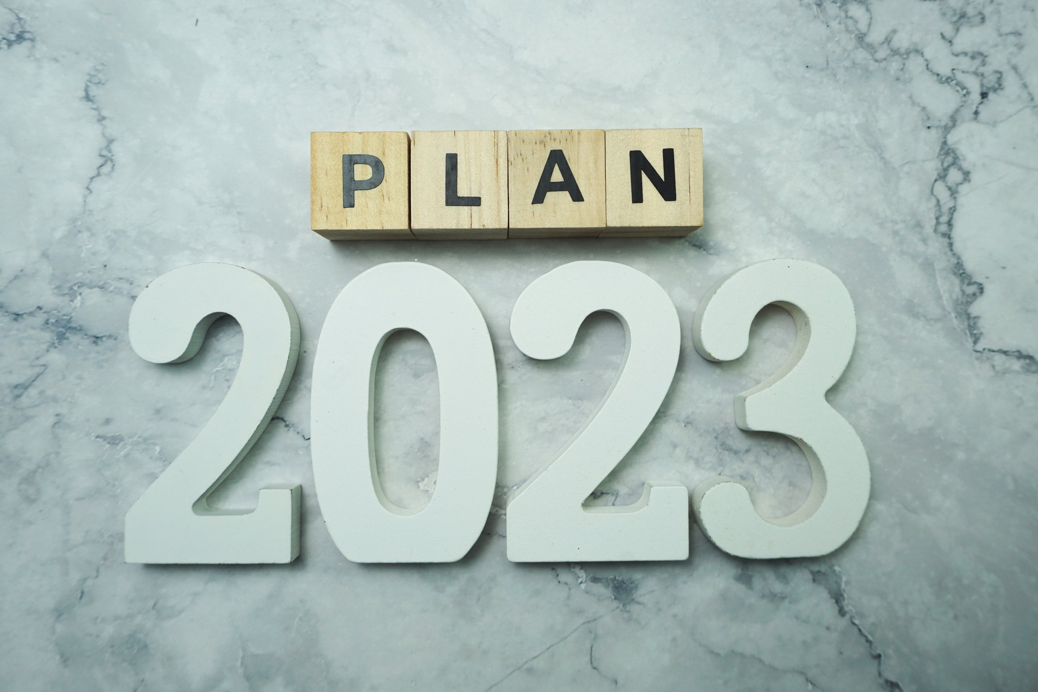 Block letters read PLAN 2023