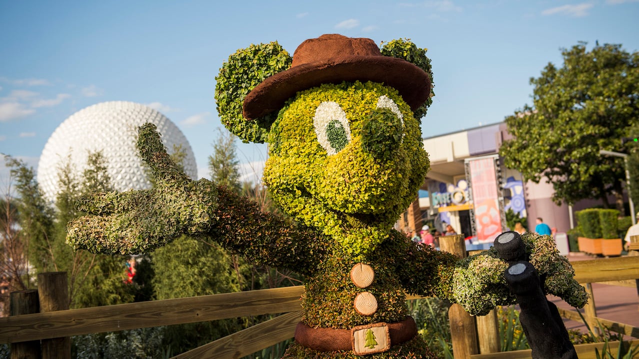 A Mickey Mouse topiary greeting guests at Disney World's Epcot.
