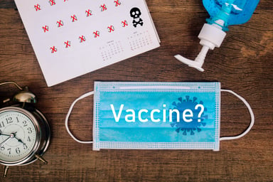 Vaccine with question mark written on face mask