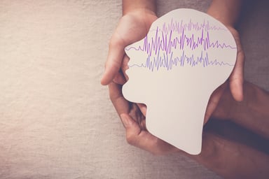 Drawing of brain with brain wave lines