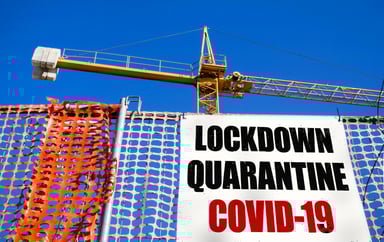 consruction site with COVID lockdown billboard