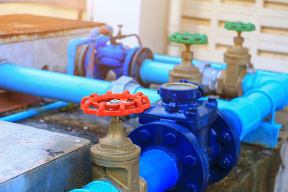 Water pipes and valves in a building. 